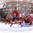 HELSINKI, FINLAND - DECEMBER 27: Denmark's Nikolaj Krag #19 celebrates behind Switzerland's Jonas Siegenthaler #25 and Joren Van Pottelberghe #30 as Team Denmark scores their first goal of the game during preliminary round action at the 2016 IIHF World Junior Championship. (Photo by Matt Zambonin/HHOF-IIHF Images)

